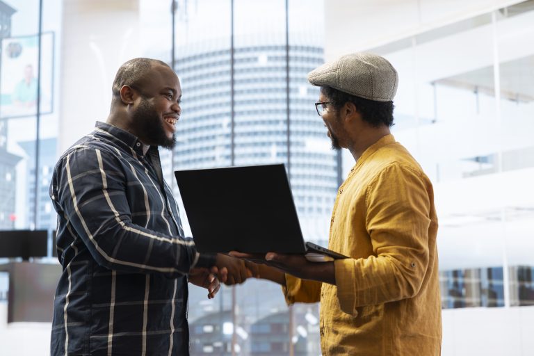 Business owner planning a property investment during office tour with broker